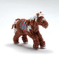 Sylvia Quam: Beaded, Horse Brown, red.& blue