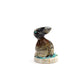 Stafford Chimoni: Picasso marble, Rabbit on antler base with turquoise