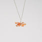 Dee Edaakie: Orange Spiny Oyster Shell, Bear Necklace